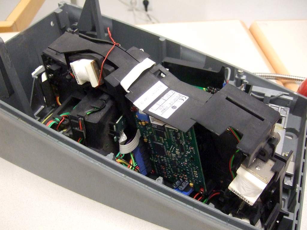 Coin checker of the pay phone Coin checker of the pay phone